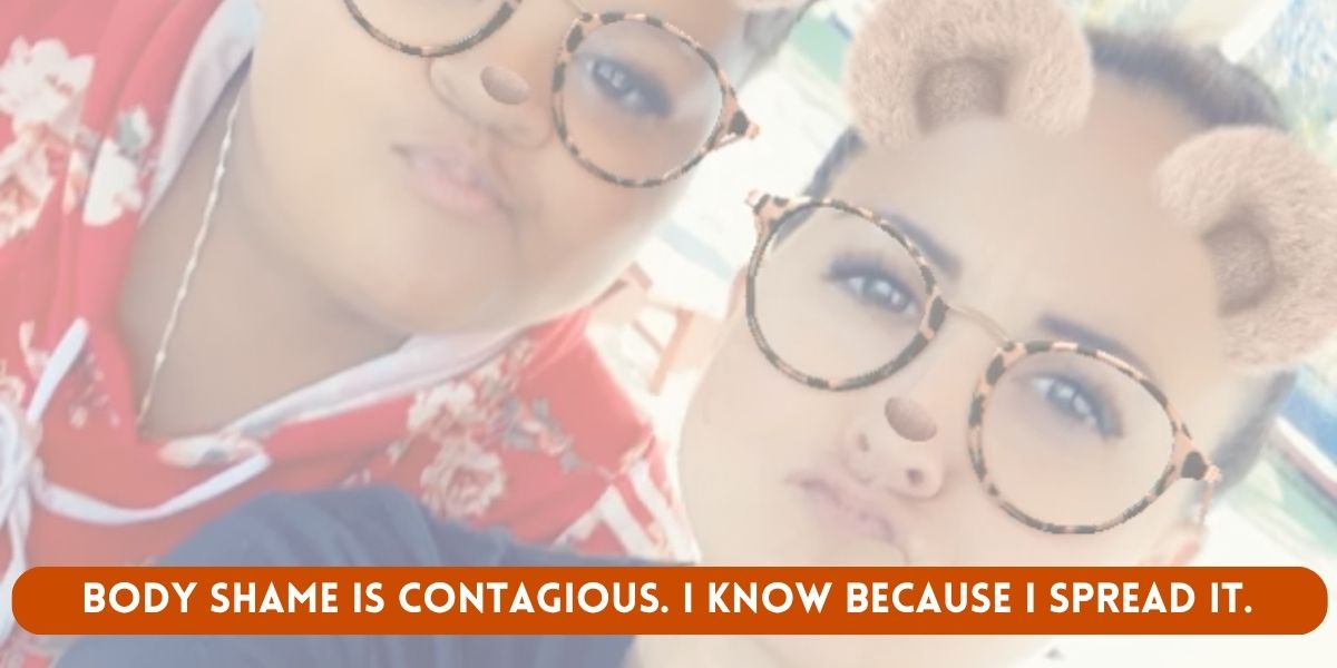 A mother and daughter taking a selfie together.